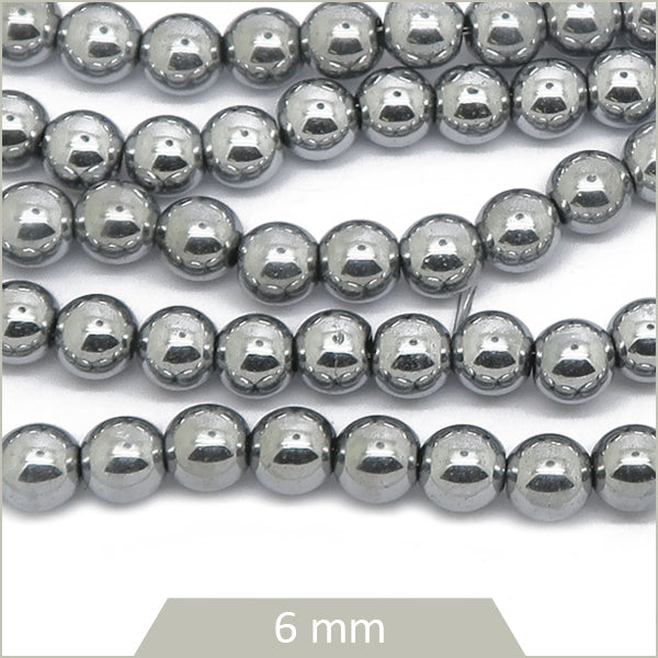 Env. 65 perles hématite rondes 6mm argentées