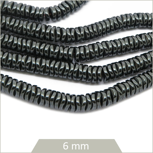 Env. 228 perles heishi ondulées en hématite gris anthracite, 6mm