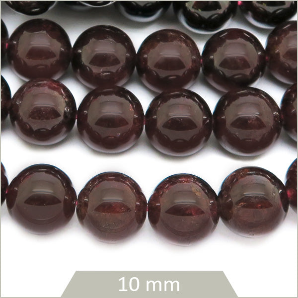 Env. 35 perles rondes en Grenat, 10 mm