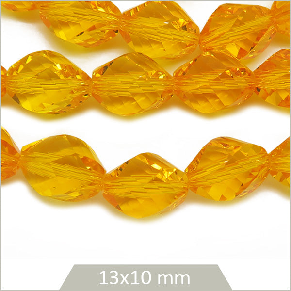 Env. 30 perles ovales à facettes en verre jaune ambré, 13x10 mm