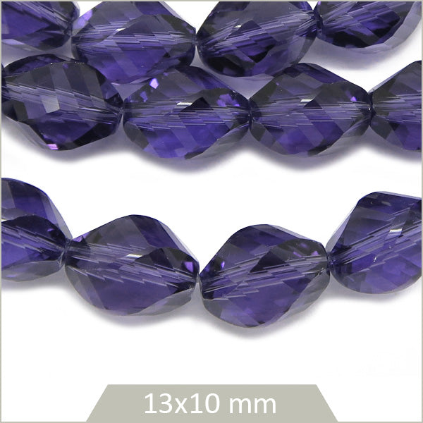 Env. 30 perles ovales à facettes en verre bleu indigo, 13x10 mm