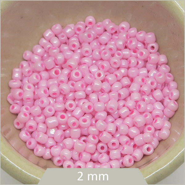 40 g de perles rocailles rose 2 mm