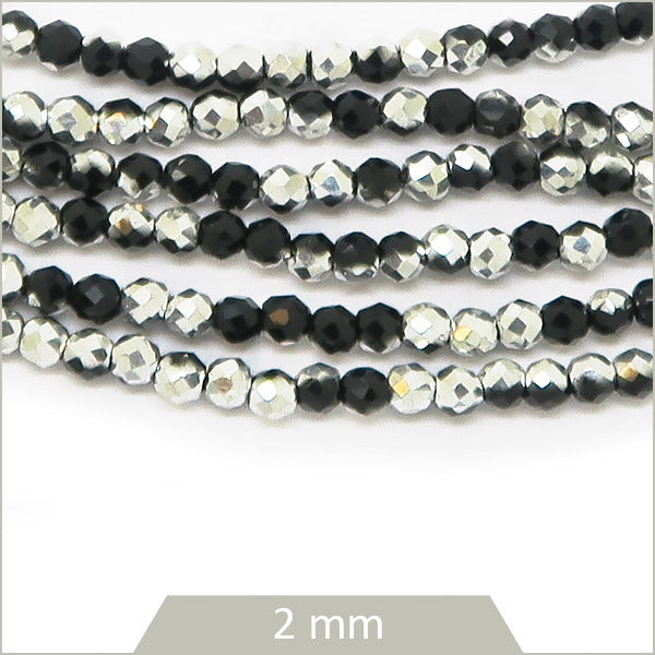 Env. 180 perles de verre rondes à facettes irisé noir argenté, effet métallisé, 2 mm