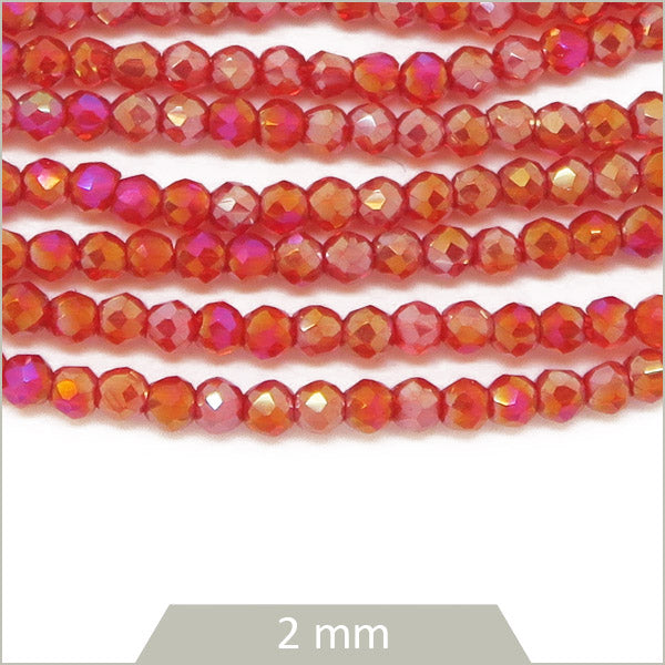 Env. 180 perles de verre rondes à facettes irisé rouge, 2 mm