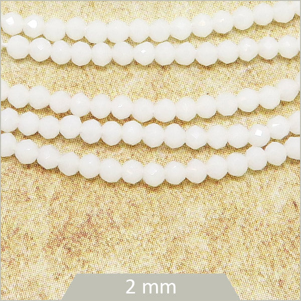 Env. 180 perles de verre rondes à facettes blanc opaque, 2 mm