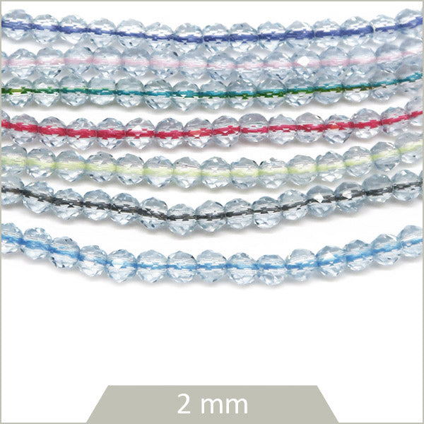 Env. 180 perles de verre rondes à facettes transparentes, 2 mm