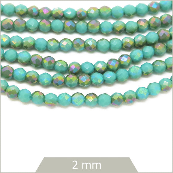 Env. 180 perles de verre rondes à facettes mix turquoise, 2 mm