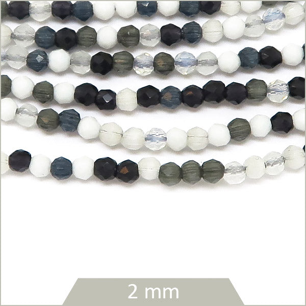 Env. 180 perles de verre rondes à facettes mix noir et blanc, 2 mm