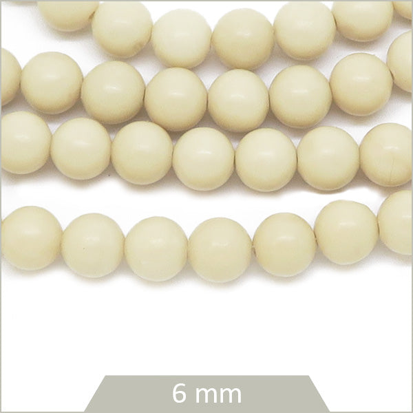 Env. 60 perles rondes en pierre fossile, 6 mm