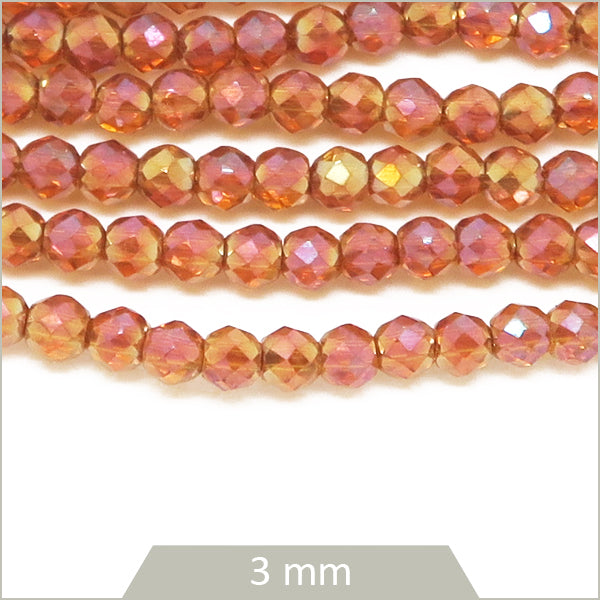Env. 120 perles de verre rondes à facettes irisé nude, 3 mm