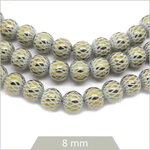 Perles en verre originale blanc et or